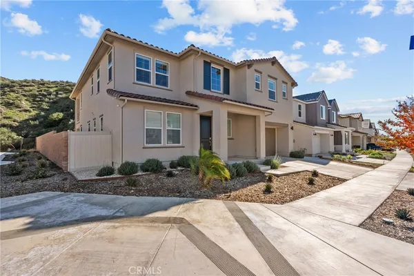 a front view of a house with entertaining space