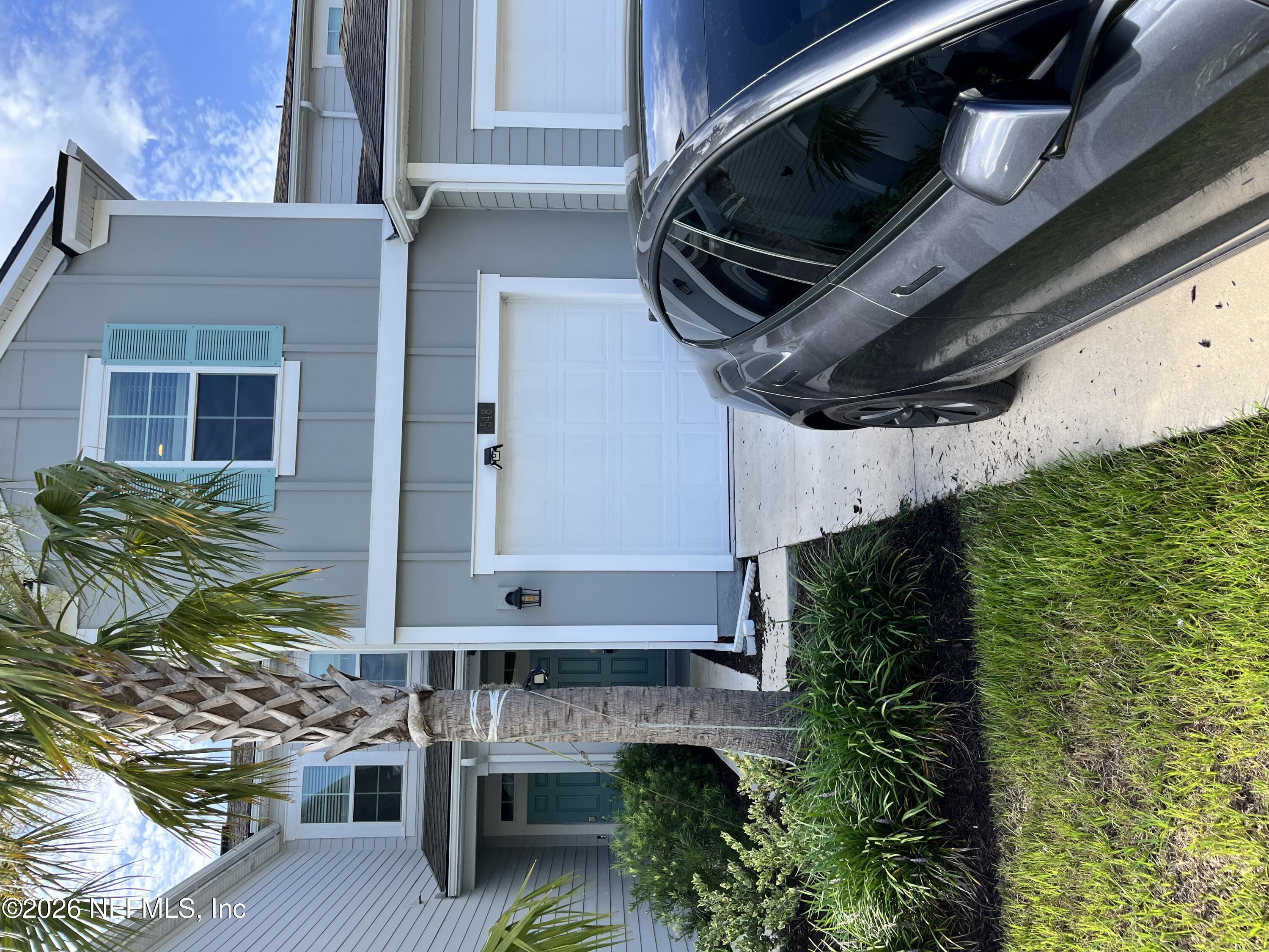 a house view with a garden space