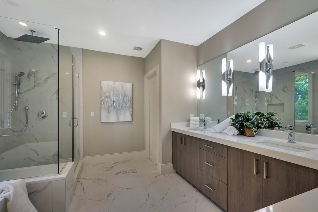 50 Gould Road Newton, MA 02468 - Photo 12 of 12 a bathroom with a sink mirror and shower