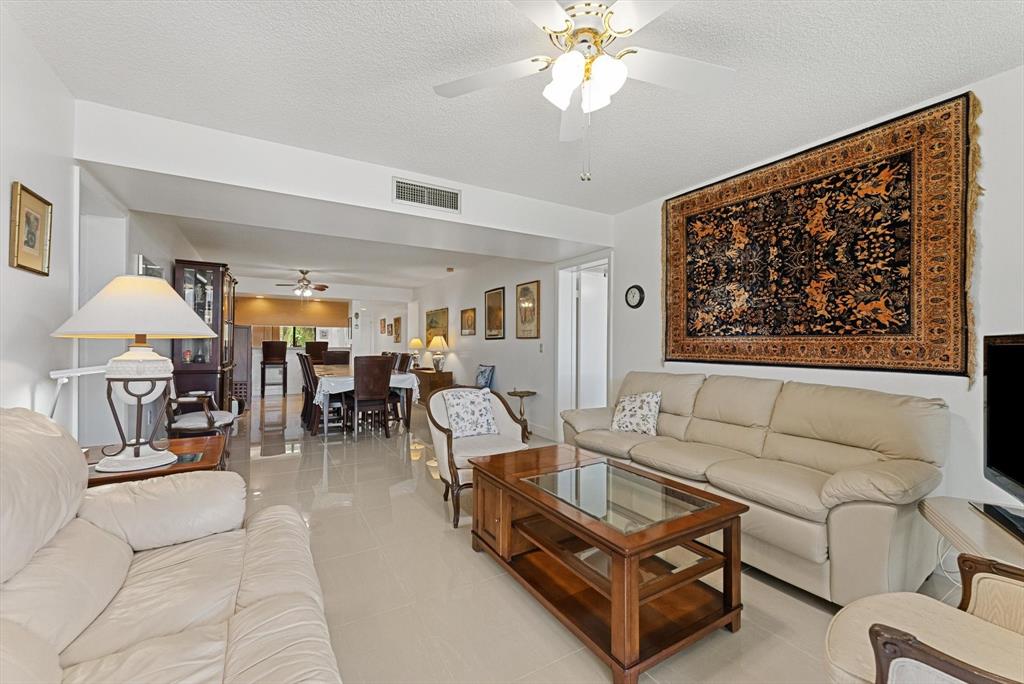 6217 Balboa Circle, Unit 305 Boca Raton, FL 33433 - Photo 13 of 28 a living room with furniture