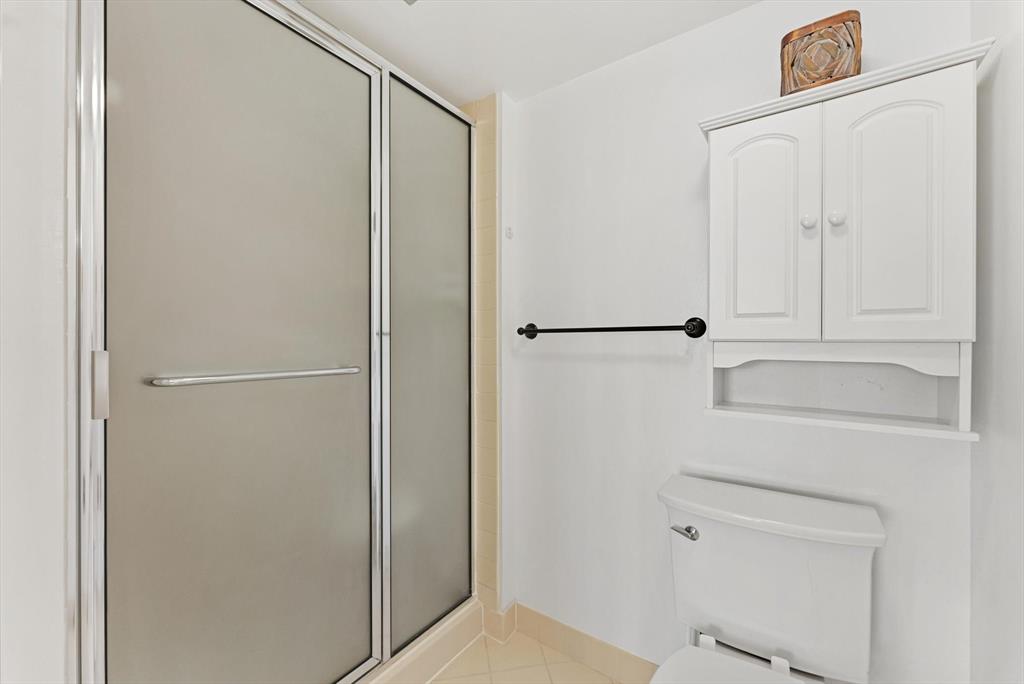 6217 Balboa Circle, Unit 305 Boca Raton, FL 33433 - Photo 17 of 28 a bathroom with a shower