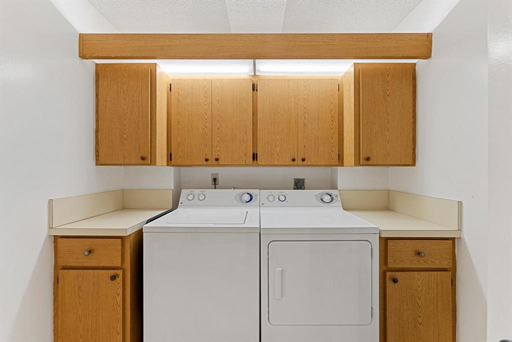 6217 Balboa Circle, Unit 305 Boca Raton, FL 33433 - Photo 23 of 28 a utility room with dryer and washer