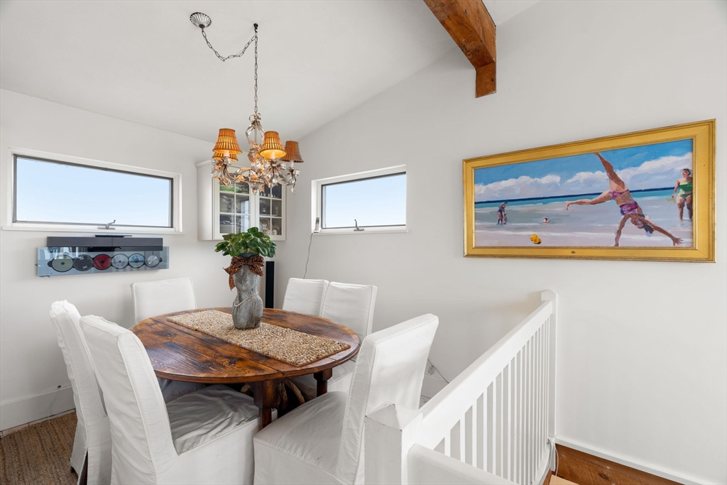 10 61st Street, Unit 10 Newburyport, MA 01950 - Photo 34 of 42 a dining room with furniture and window