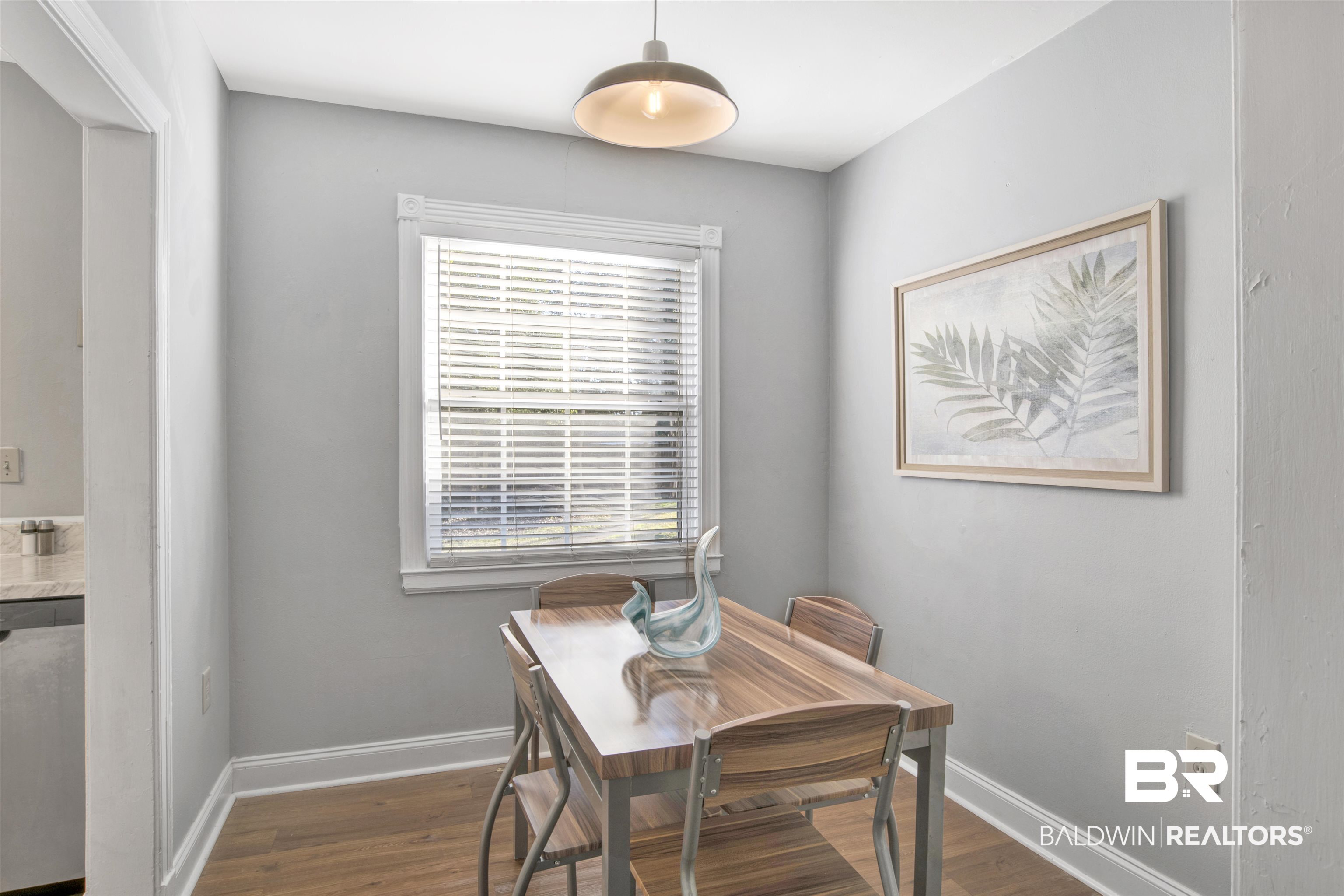 214 Upham Street, Unit 7A Mobile, AL 36607 - Photo 1 of 35 Dining space with dark wood finished floors
