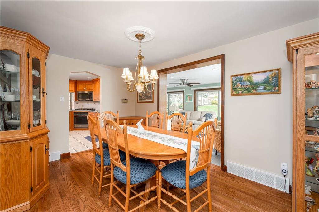 502 Nichols Road Pittsburgh, PA 15237 - Photo 11 of 46 a view of a dining room with furniture wooden floor and chandelier