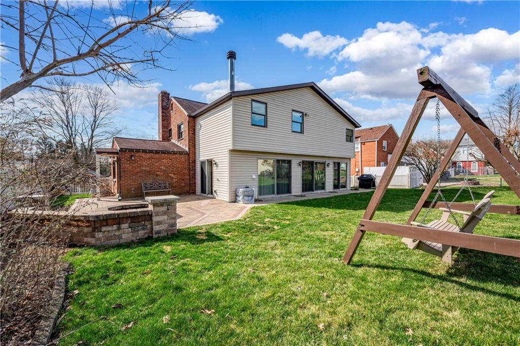 502 Nichols Road Pittsburgh, PA 15237 - Photo 22 of 46 a view of an house with backyard and a slide