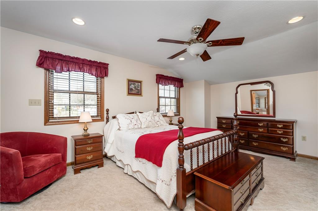 502 Nichols Road Pittsburgh, PA 15237 - Photo 30 of 46 a bedroom with a bed a dresser and a window