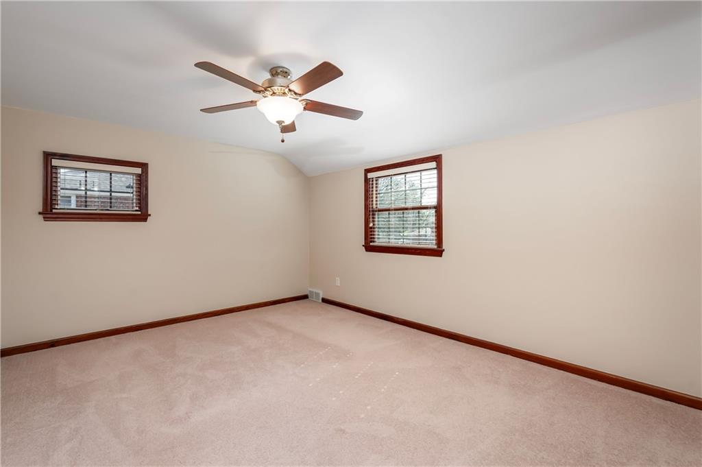 502 Nichols Road Pittsburgh, PA 15237 - Photo 34 of 46 an empty room with windows and fan