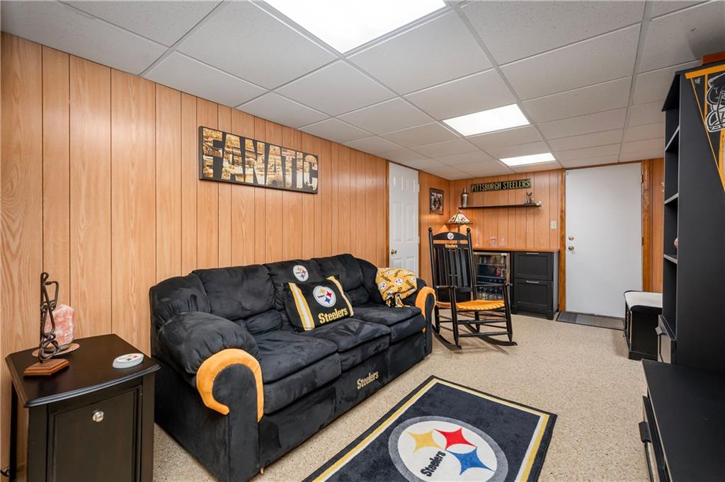 502 Nichols Road Pittsburgh, PA 15237 - Photo 41 of 46 a living room with furniture and a flat screen tv