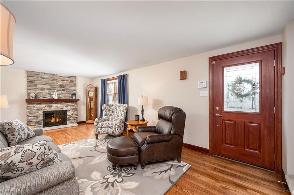 502 Nichols Road Pittsburgh, PA 15237 - Photo 6 of 46 a living room with furniture and a fireplace