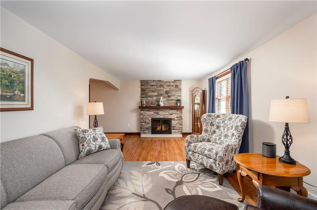 502 Nichols Road Pittsburgh, PA 15237 - Photo 7 of 46 a living room with furniture and a fireplace