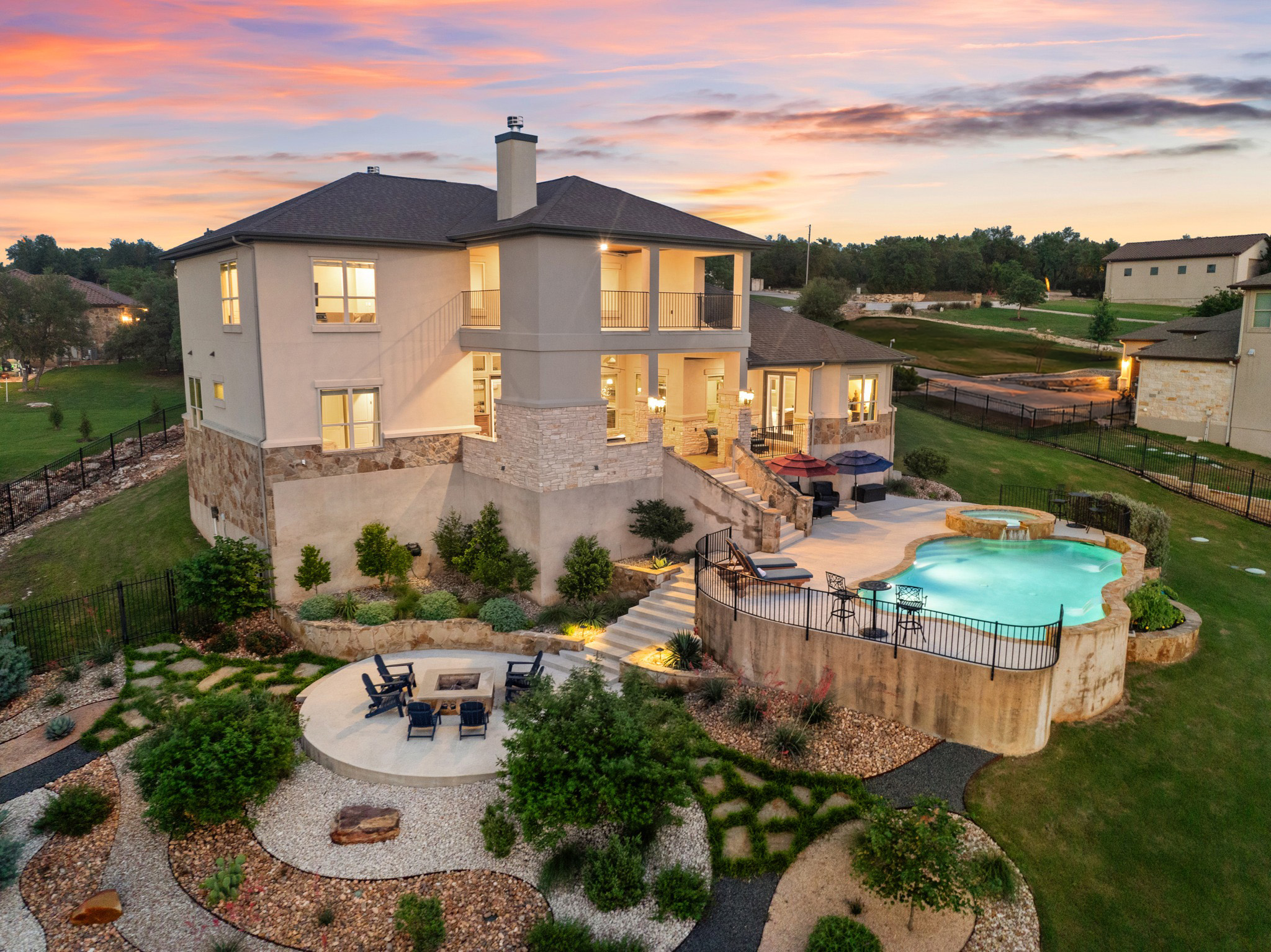 204 Wilderness Trail Georgetown, TX 78633 - Photo 1 of 38 a front view of a house with swimming pool having outdoor seating