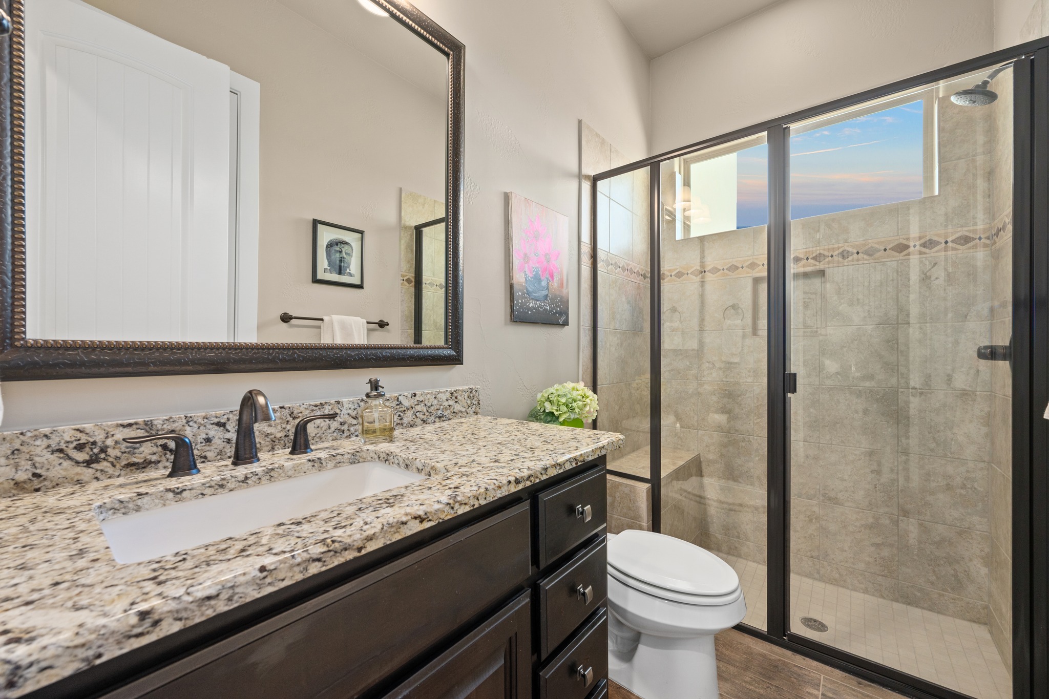 204 Wilderness Trail Georgetown, TX 78633 - Photo 25 of 38 a bathroom with a granite countertop sink toilet and shower
