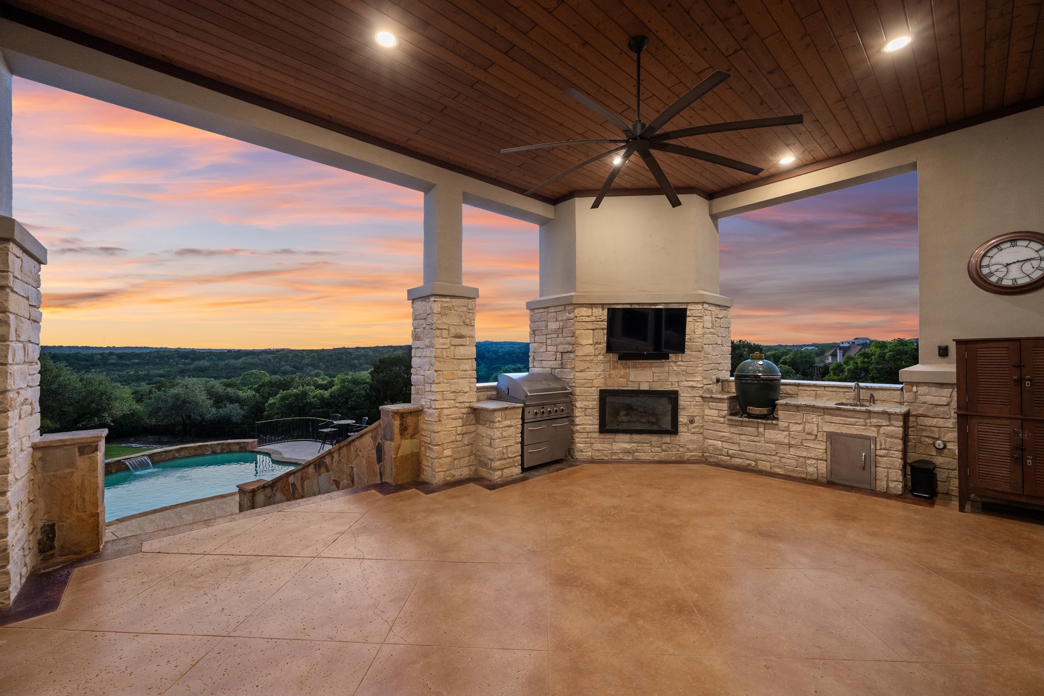 204 Wilderness Trail Georgetown, TX 78633 - Photo 35 of 38 a view of a patio with a tv tv and outdoor seating
