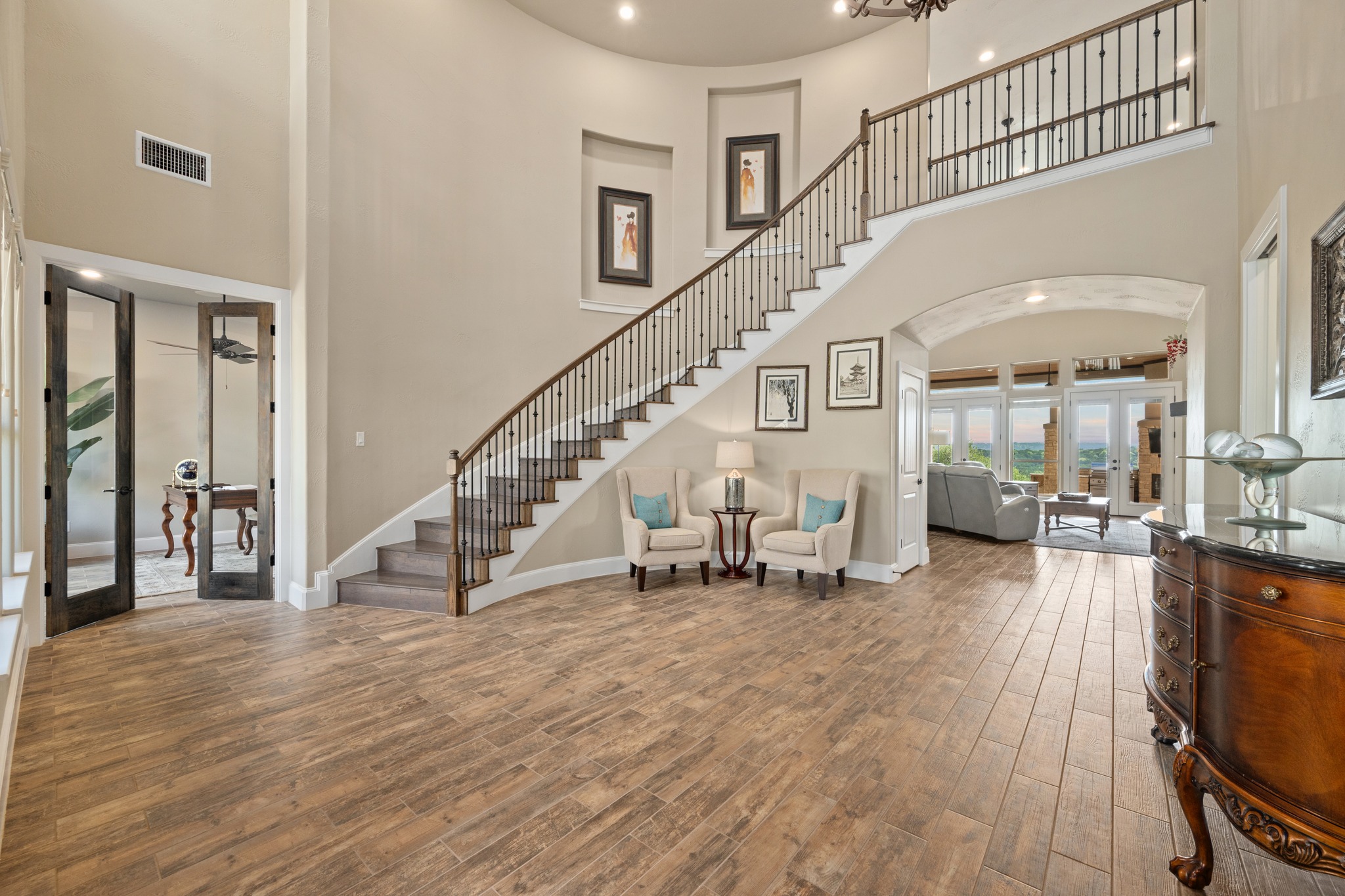 204 Wilderness Trail Georgetown, TX 78633 - Photo 9 of 38 a view of entryway and hall with wooden floor