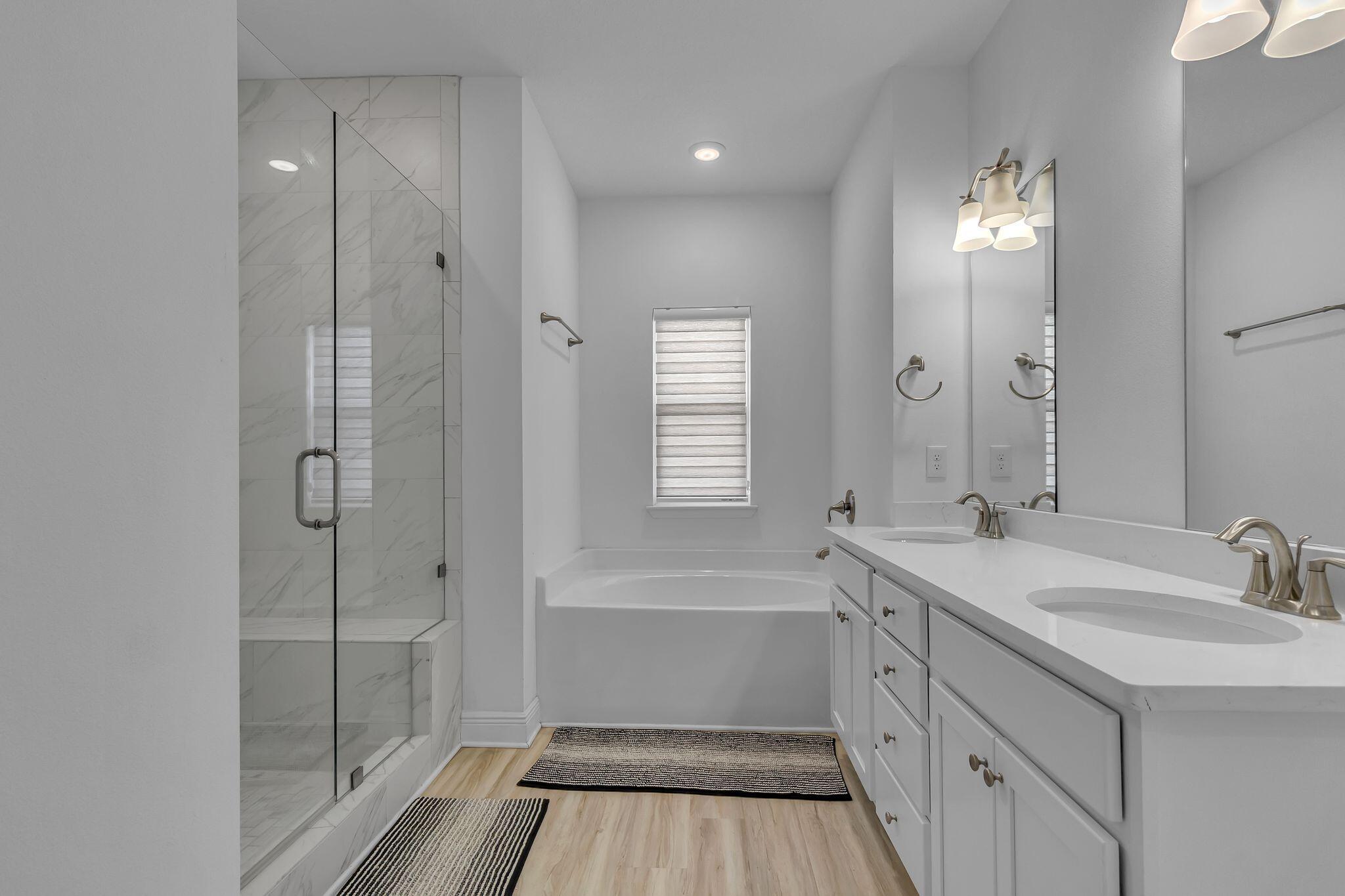 77 Spoonbill Road, Unit LOT 66 Santa Rosa Beach, FL 32459 - Photo 18 of 48 a bathroom with a sink a toilet and shower