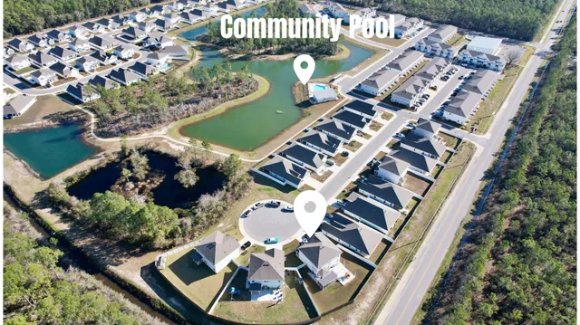 an aerial view of a house with outdoor space