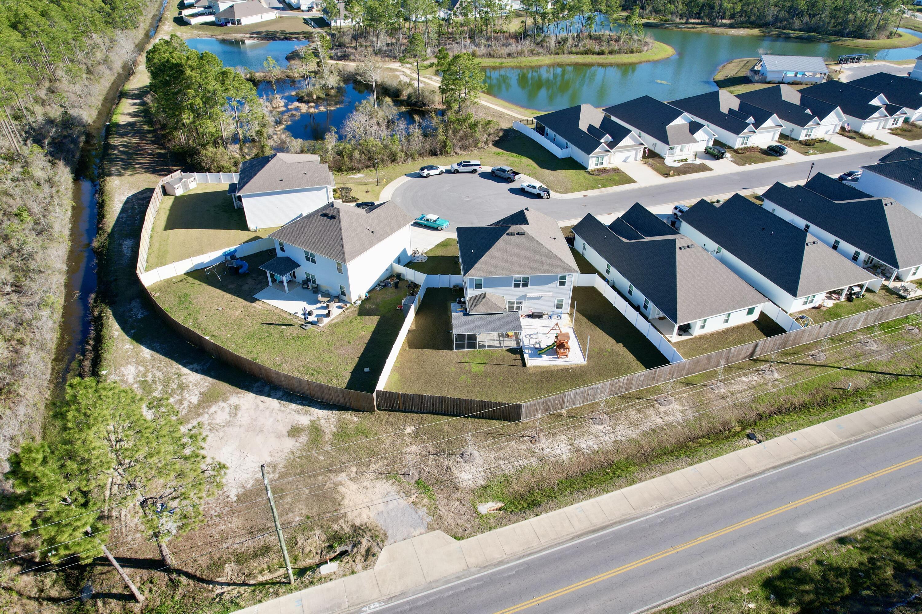 77 Spoonbill Road, Unit LOT 66 Santa Rosa Beach, FL 32459 - Photo 41 of 48 an aerial view of a house with outdoor space