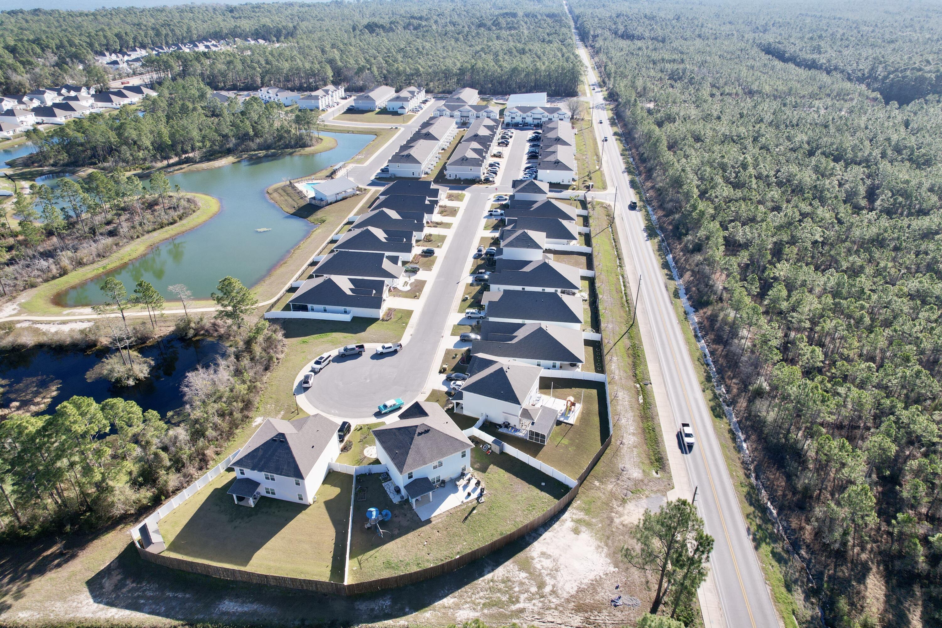 77 Spoonbill Road, Unit LOT 66 Santa Rosa Beach, FL 32459 - Photo 45 of 48 an aerial view of a house