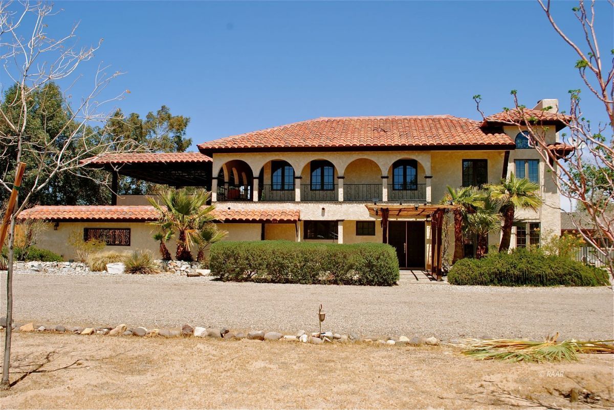 1544 Autumn Avenue Ridgecrest, CA 93555 - Photo 1 of 1 a front view of a house with a yard