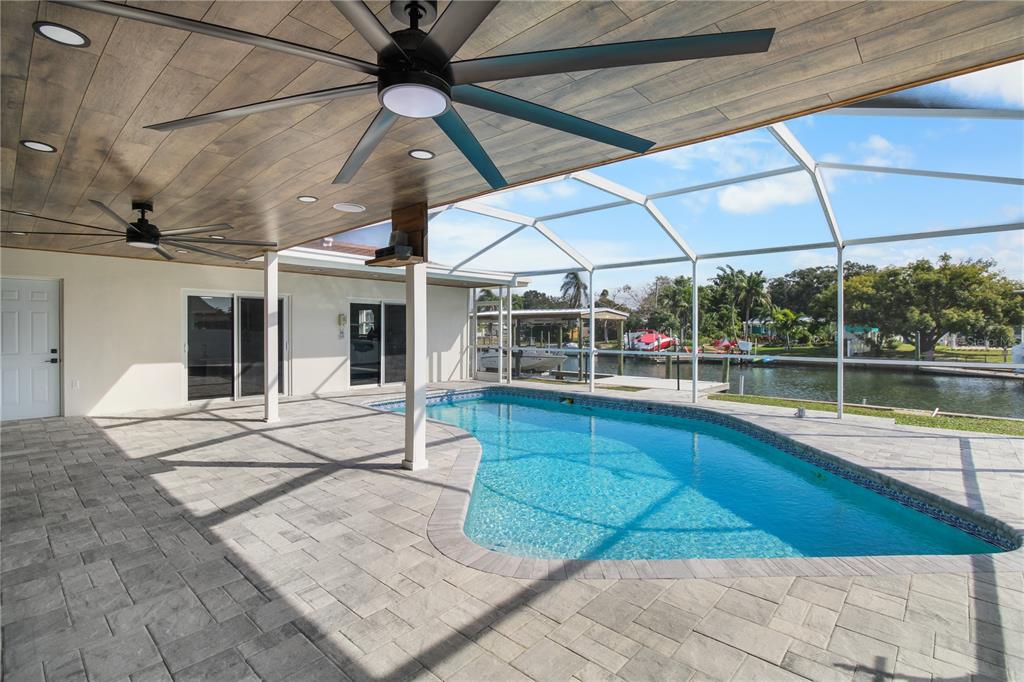 1575 Brookside Boulevard Largo, FL 33770 - Photo 3 of 42 a view of swimming pool with seating space
