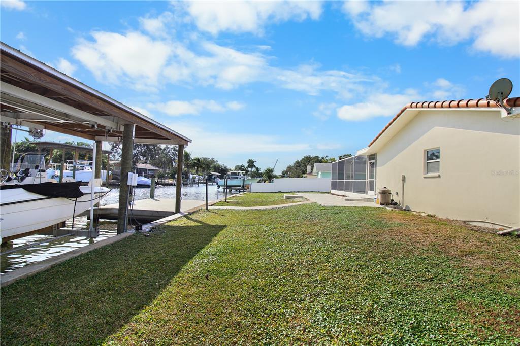 1575 Brookside Boulevard Largo, FL 33770 - Photo 39 of 42 a view of swimming pool with a yard
