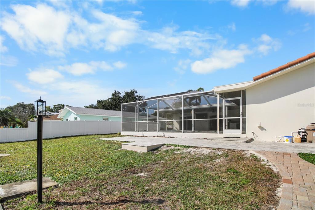 1575 Brookside Boulevard Largo, FL 33770 - Photo 40 of 42 a view of a house with a backyard
