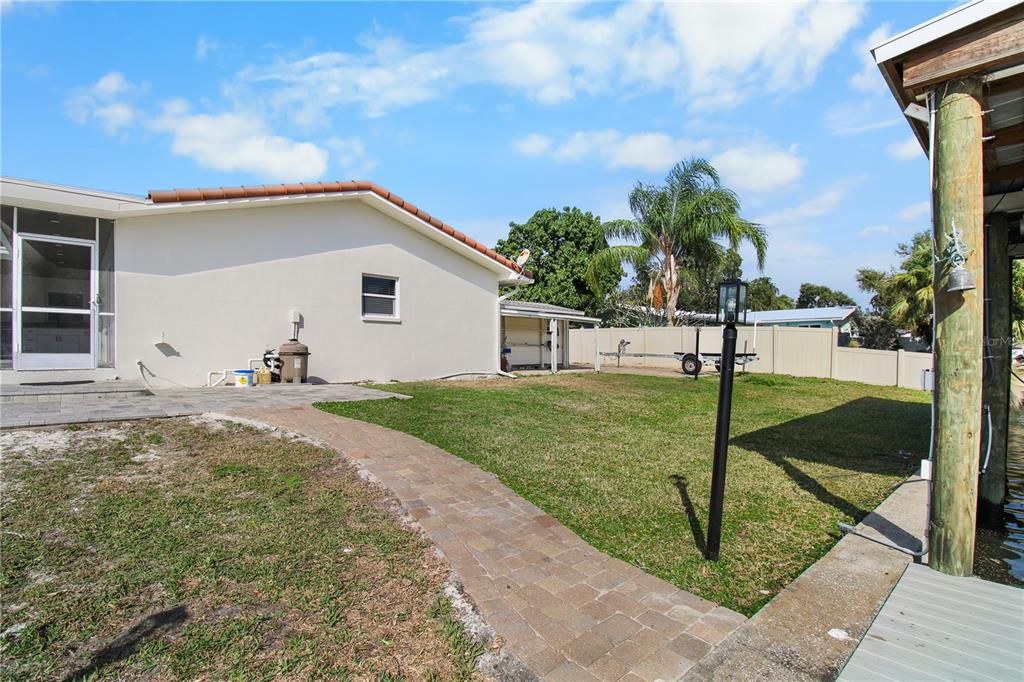 1575 Brookside Boulevard Largo, FL 33770 - Photo 41 of 42 a view of a backyard of the house