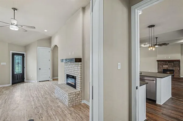 a view of swimming pool with chairs in roof deck
