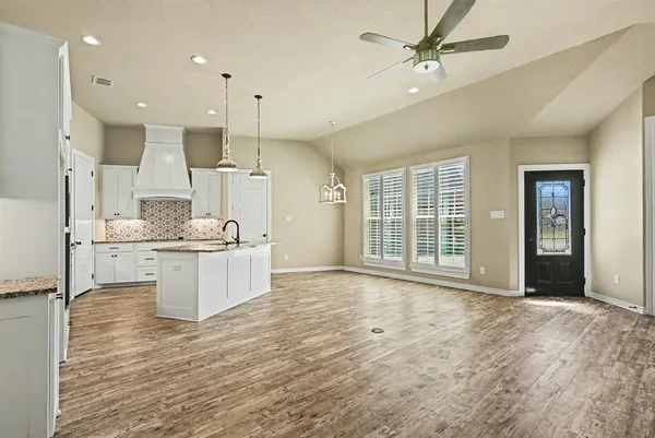 a house view with a garden space