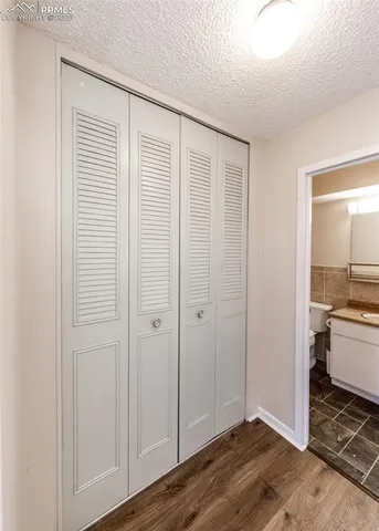 a view of an empty walk in closet