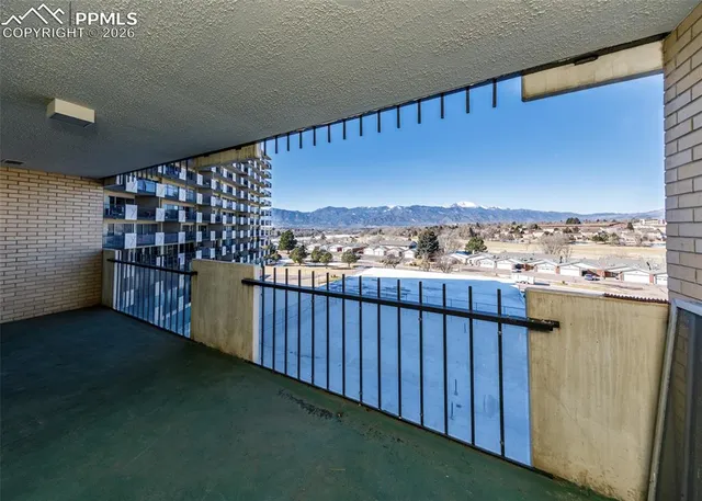 a view of city from a balcony