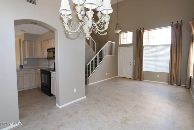 a view of a kitchen with a sink cabinets and a window