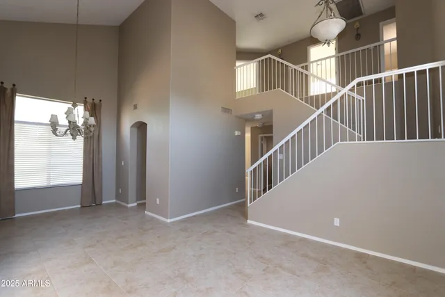 a view of a hallway with windows