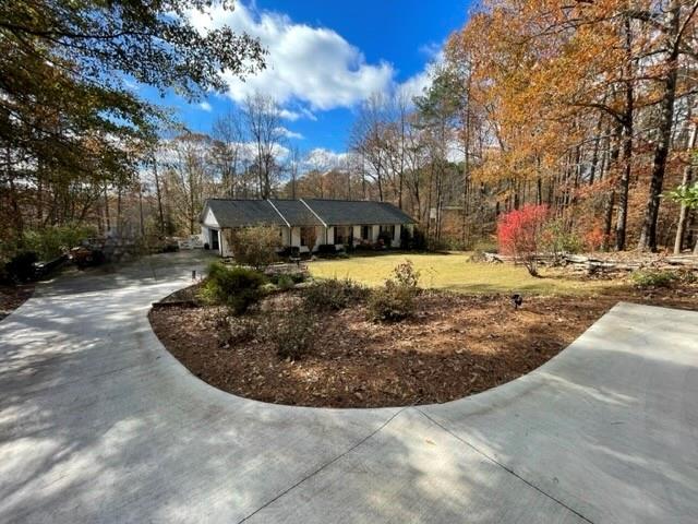 1220 Arbor Hill Road Canton, GA 30115 - Photo 1 of 1 a view of a backyard of the house