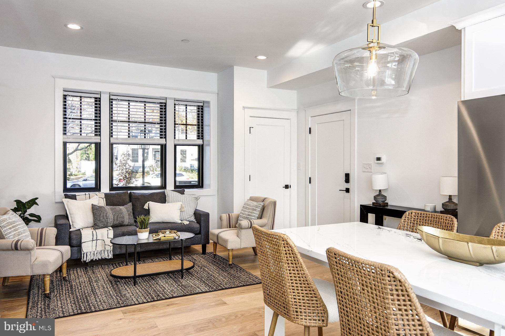 20 East Redman Avenue, Unit B Haddonfield, NJ 08033 - Photo 20 of 43 a bedroom with a bed and wooden floor