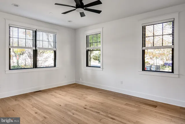 a bathroom with double vanity sink and a mirror