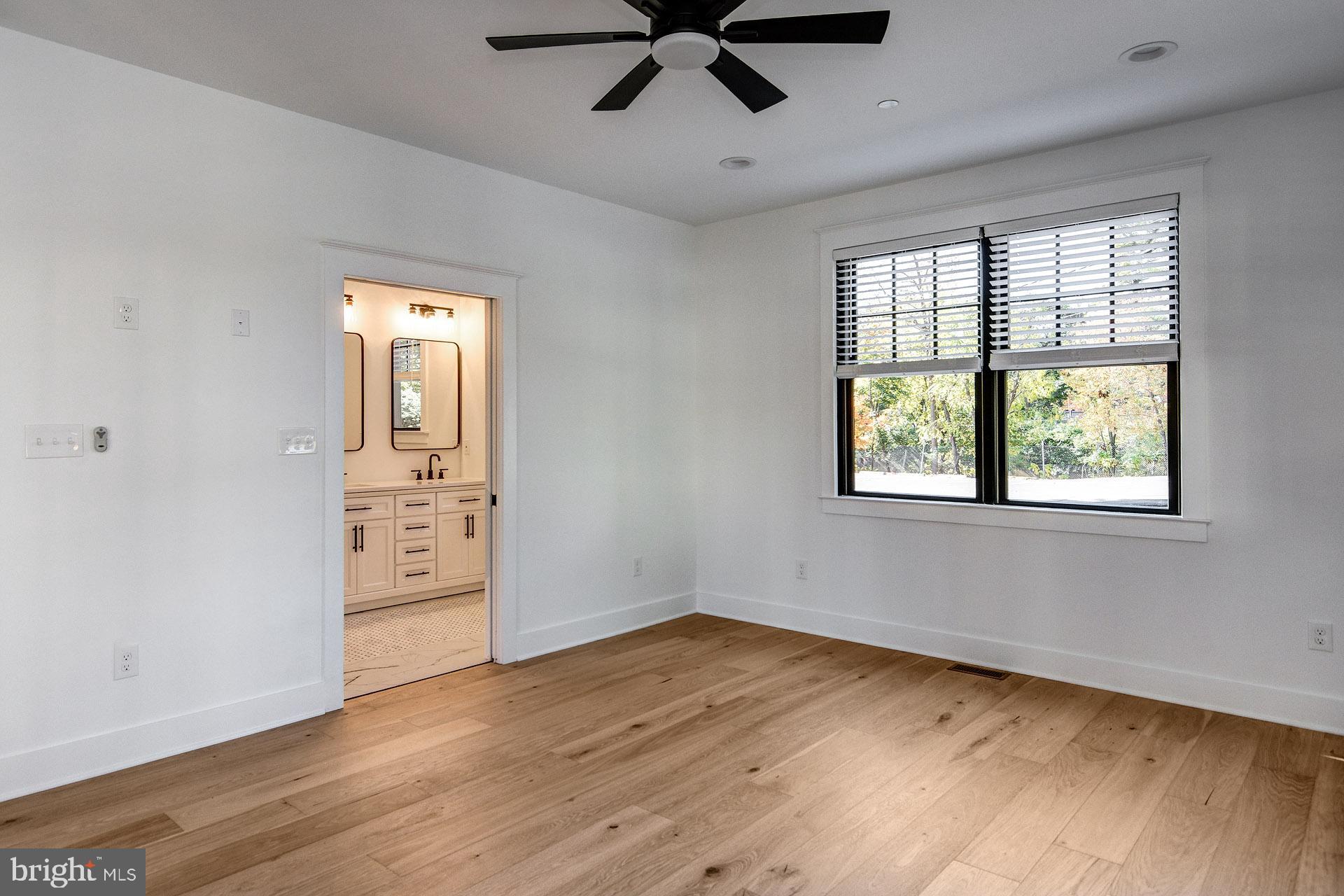 20 East Redman Avenue, Unit B Haddonfield, NJ 08033 - Photo 27 of 43 wooden floor in an empty room with a window