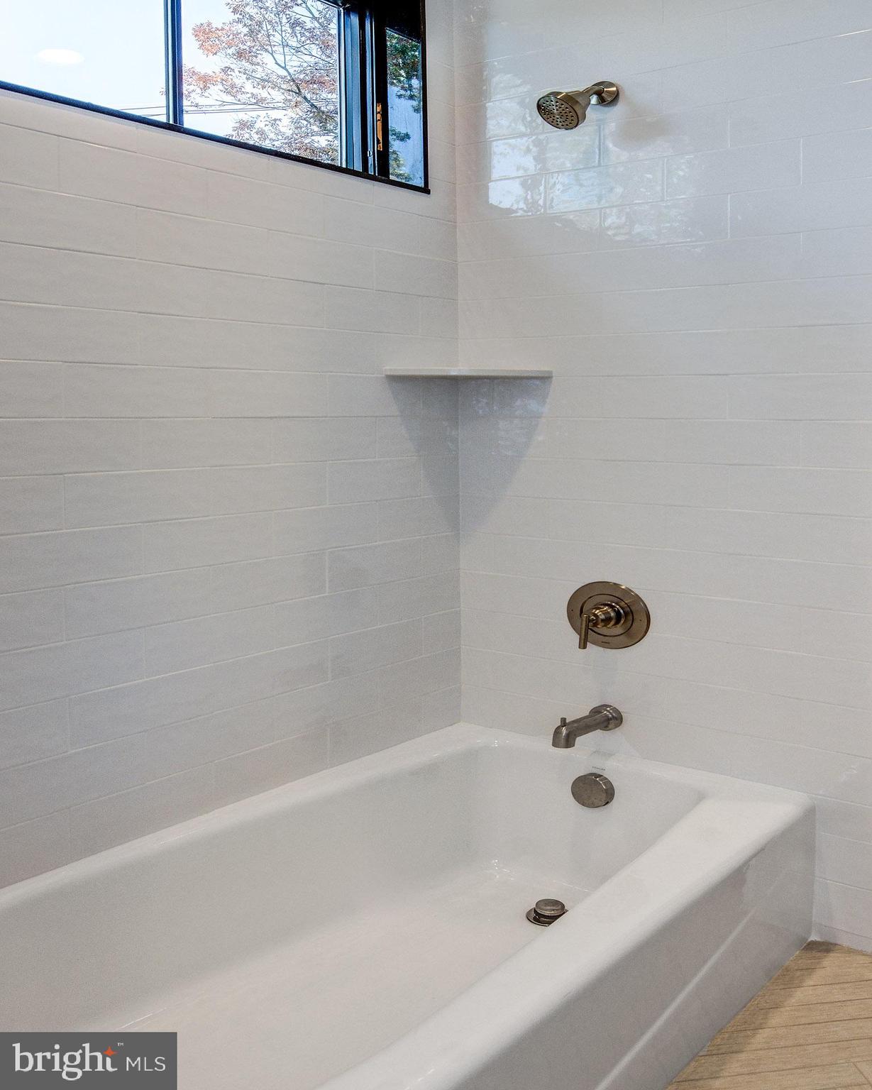 20 East Redman Avenue, Unit B Haddonfield, NJ 08033 - Photo 36 of 43 a bathroom with a bathtub