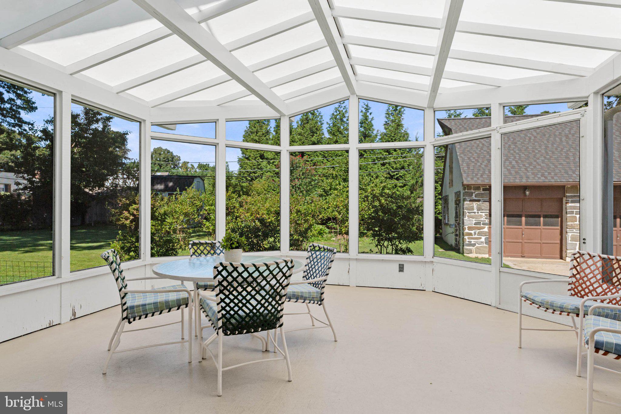 13 Green Valley Road Wallingford, PA 19086 - Photo 22 of 64 Beautiful, Large Screened Porch Overlooks Backyard