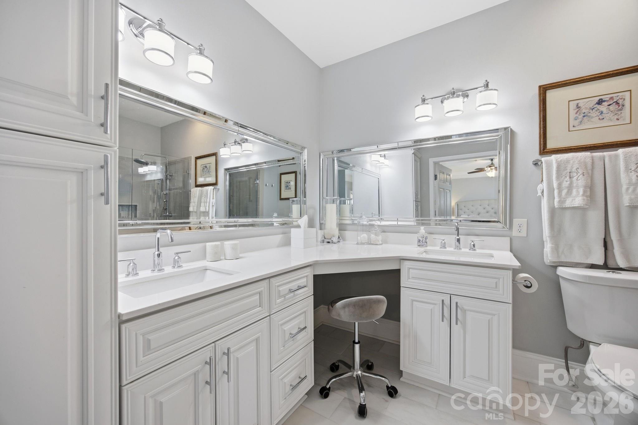 8942 Rosalyn Glen Road Cornelius, NC 28031 - Photo 22 of 47 a bathroom with a sink double vanity and a mirror