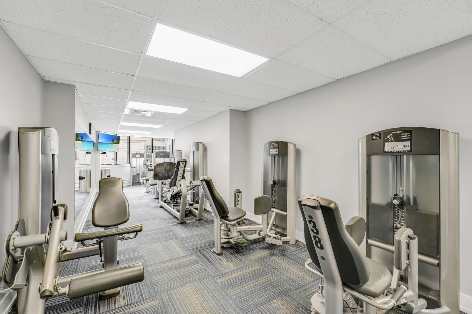 405 North Wabash Avenue, Unit 901 Chicago, IL 60611 - Photo 13 of 21 a view of a room with gym equipment