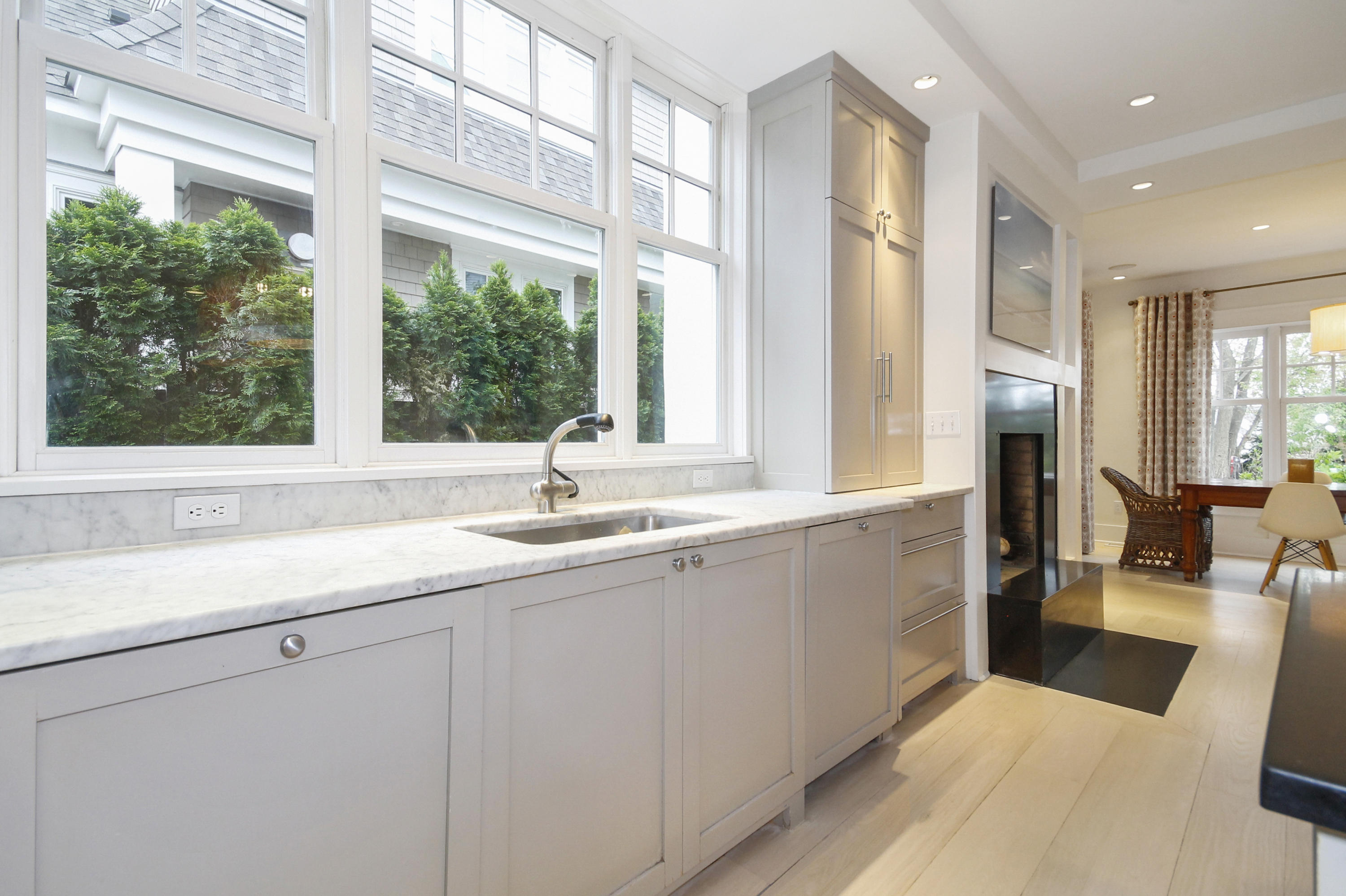2 Rowayton Avenue Rowayton, CT 06853 - Photo 14 of 43 a large white kitchen with a large window