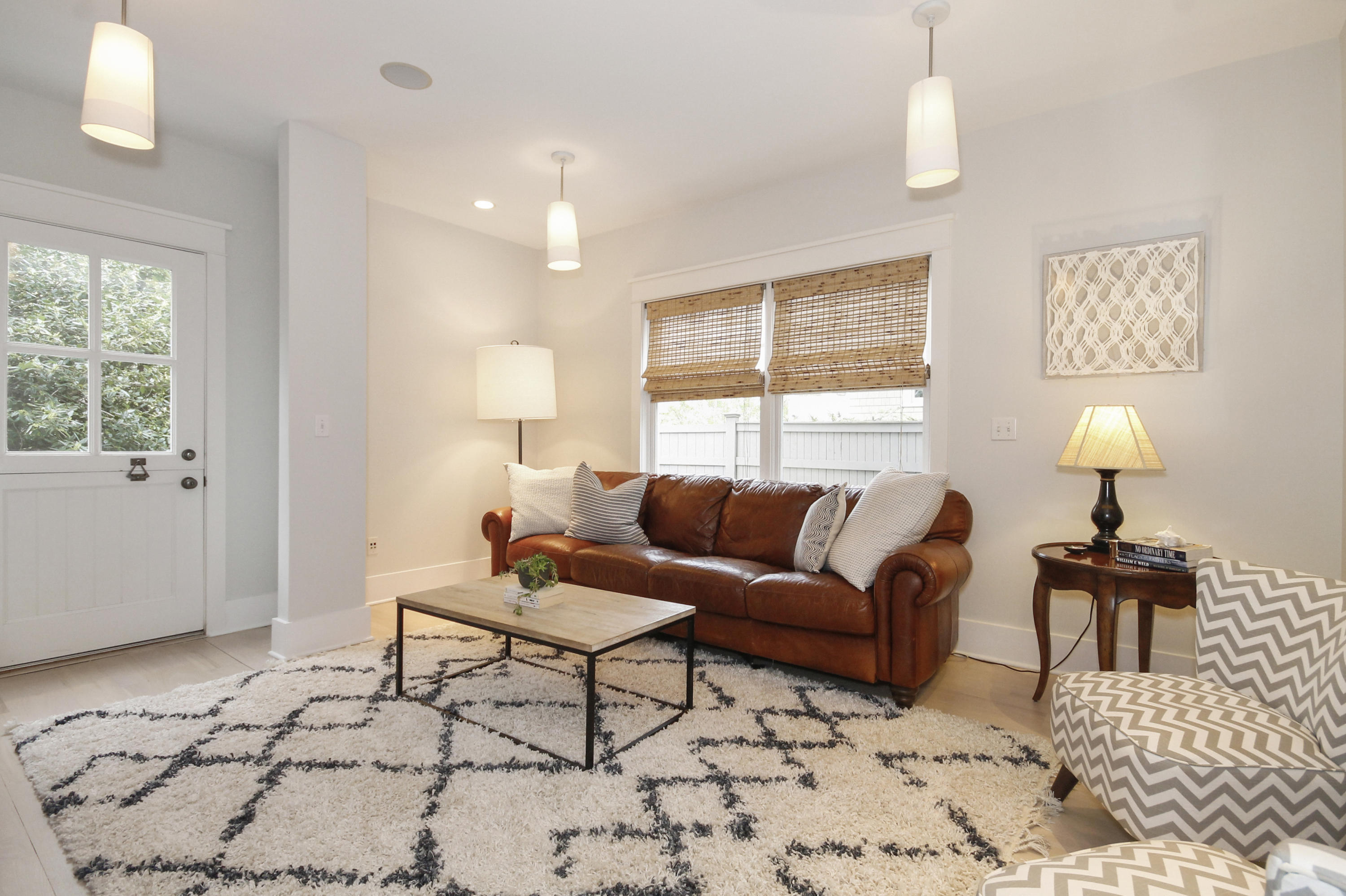 2 Rowayton Avenue Rowayton, CT 06853 - Photo 21 of 43 a living room with furniture and a lamp