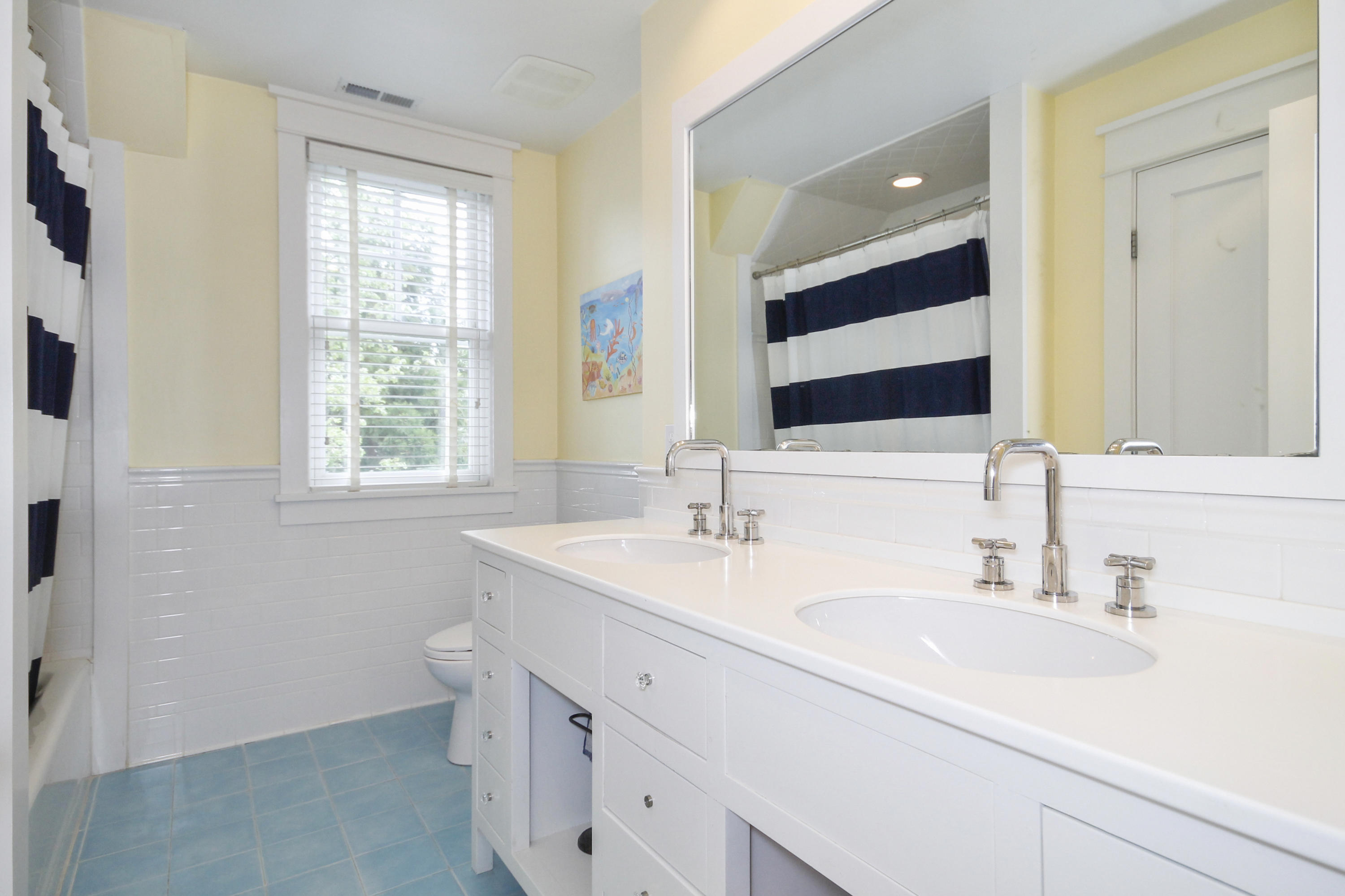 2 Rowayton Avenue Rowayton, CT 06853 - Photo 32 of 43 a bathroom with a sink and a mirror