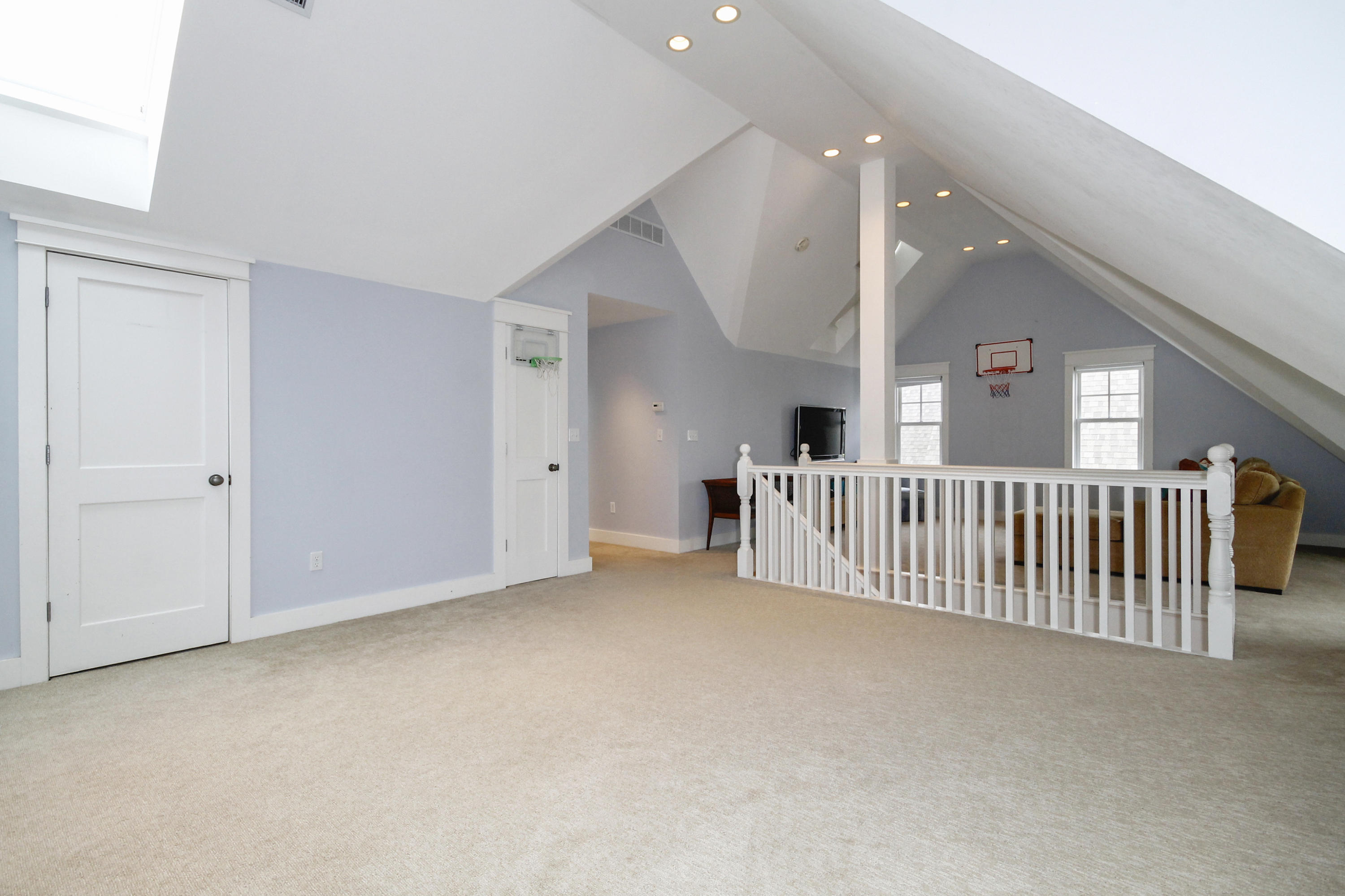 2 Rowayton Avenue Rowayton, CT 06853 - Photo 34 of 43 en view interior of a house with stairs and windows