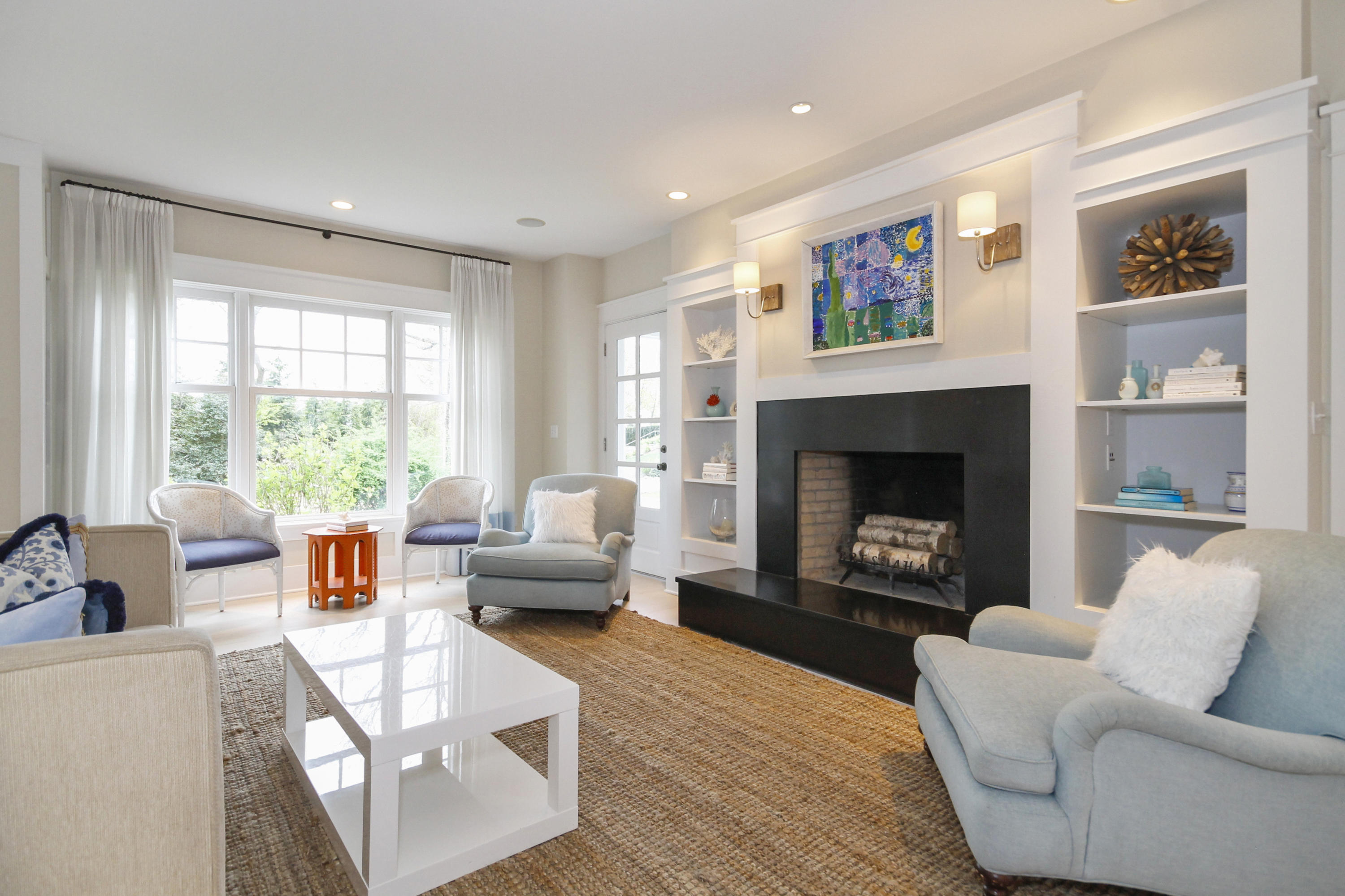 2 Rowayton Avenue Rowayton, CT 06853 - Photo 5 of 43 a living room with furniture and a fireplace