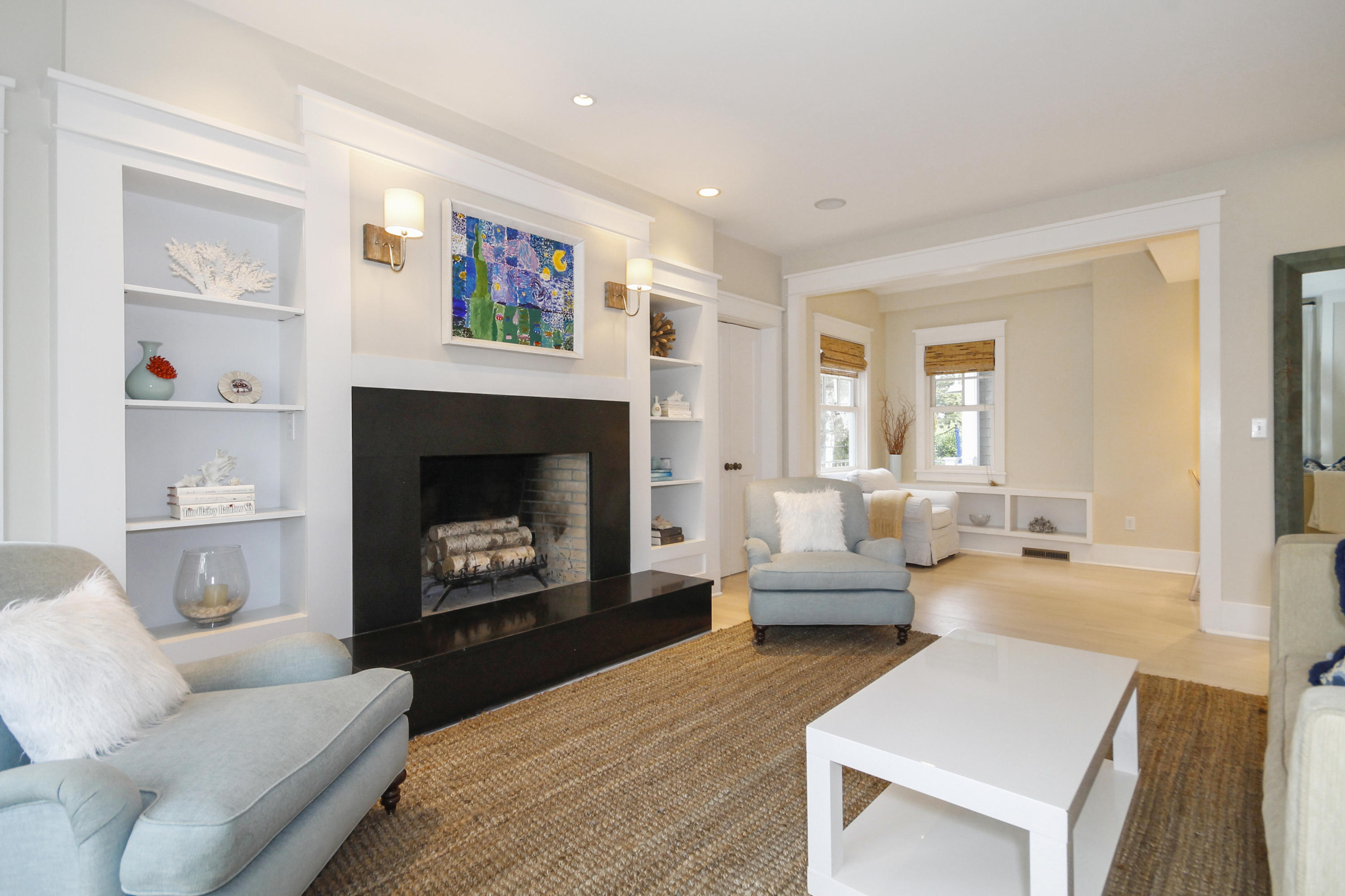 2 Rowayton Avenue Rowayton, CT 06853 - Photo 6 of 43 a living room with furniture and a fireplace