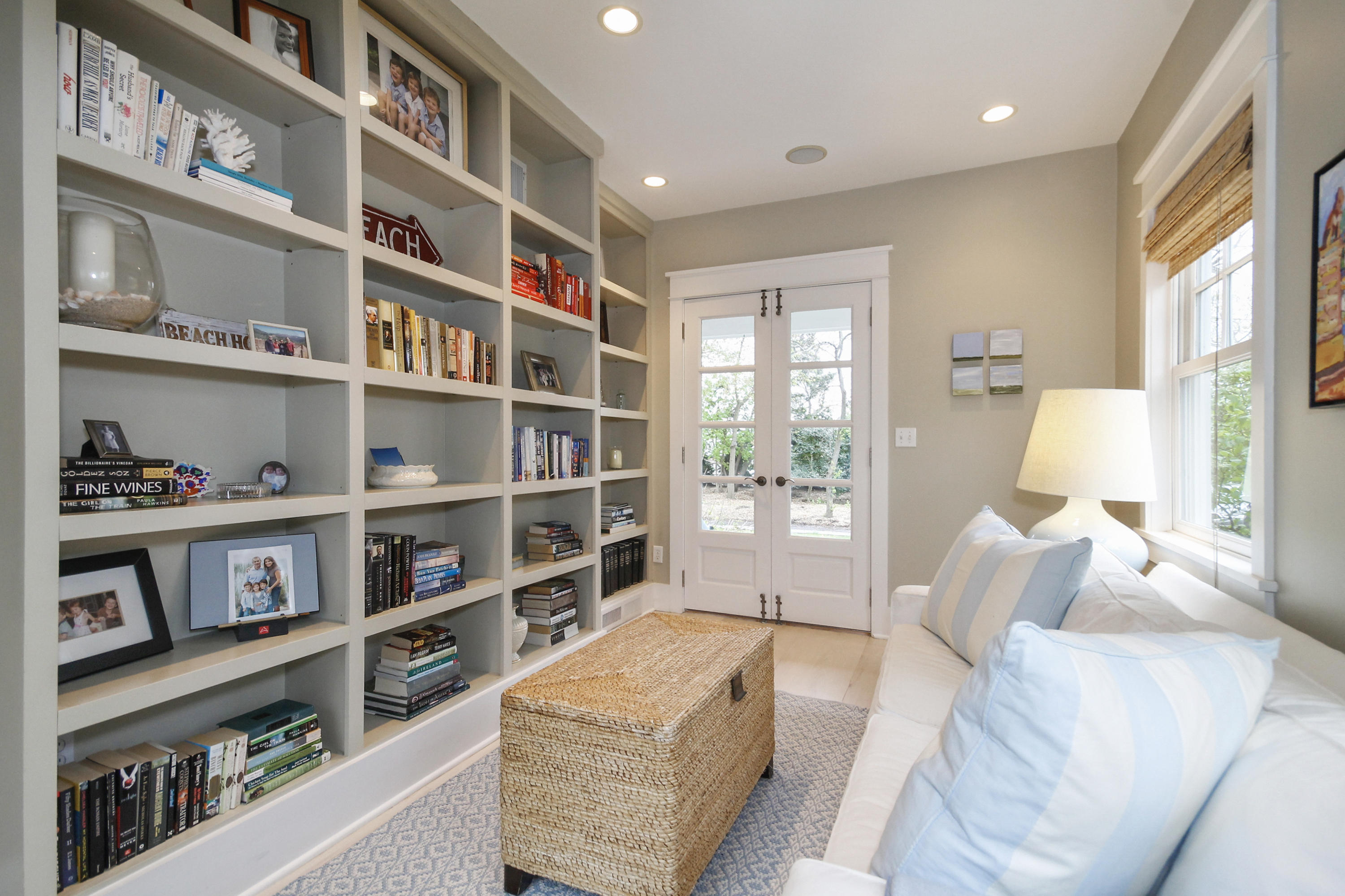 2 Rowayton Avenue Rowayton, CT 06853 - Photo 9 of 43 a living room with furniture and a book shelf