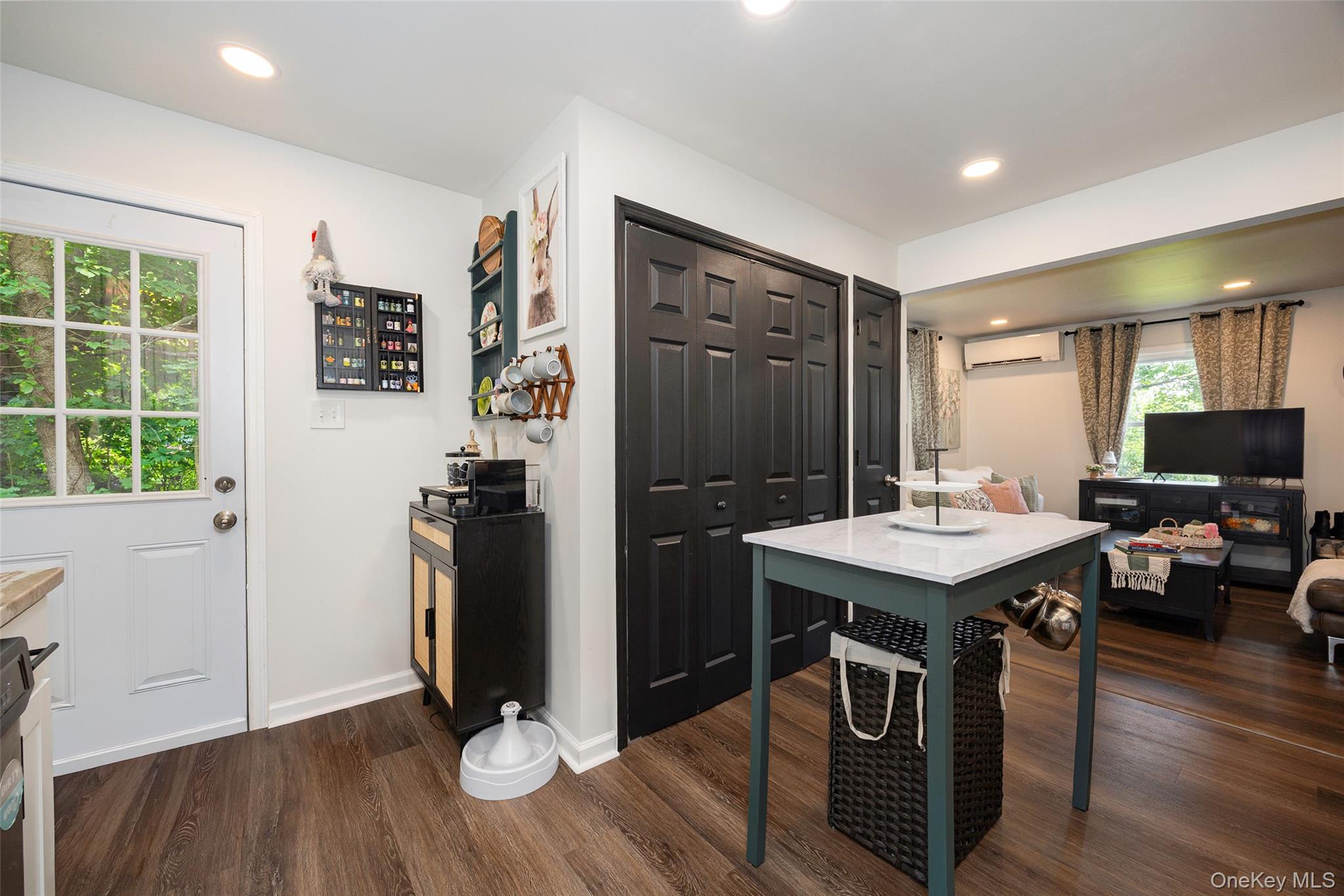 148 Bower Road Poughkeepsie, NY 12603 - Photo 11 of 19 a view of a kitchen area with furniture and wooden floor